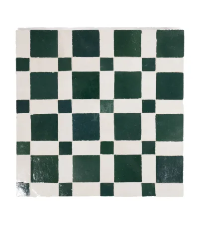 a green and white checkered tile
